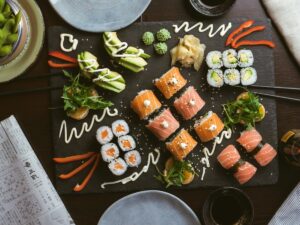 sushi on black ceramic plate